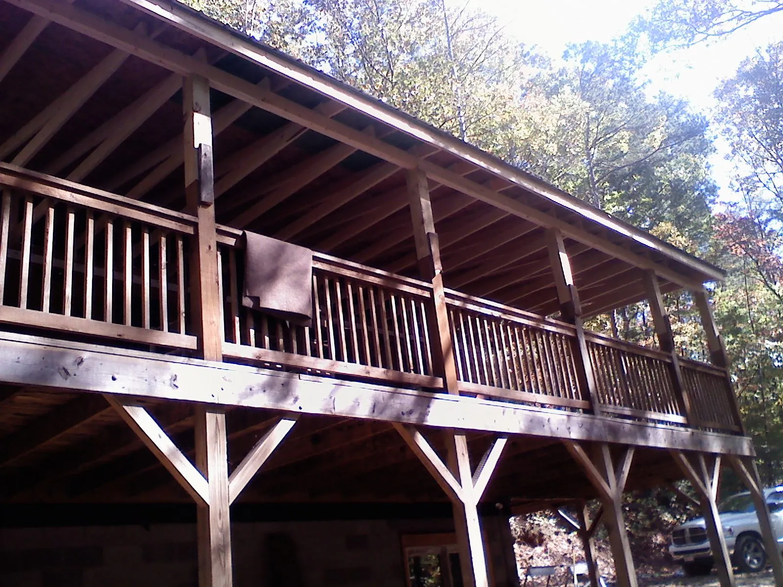 Timber framing under a new elevated porch and deck — Roof Leak Repair in Pittsboro by Roofing Brothers